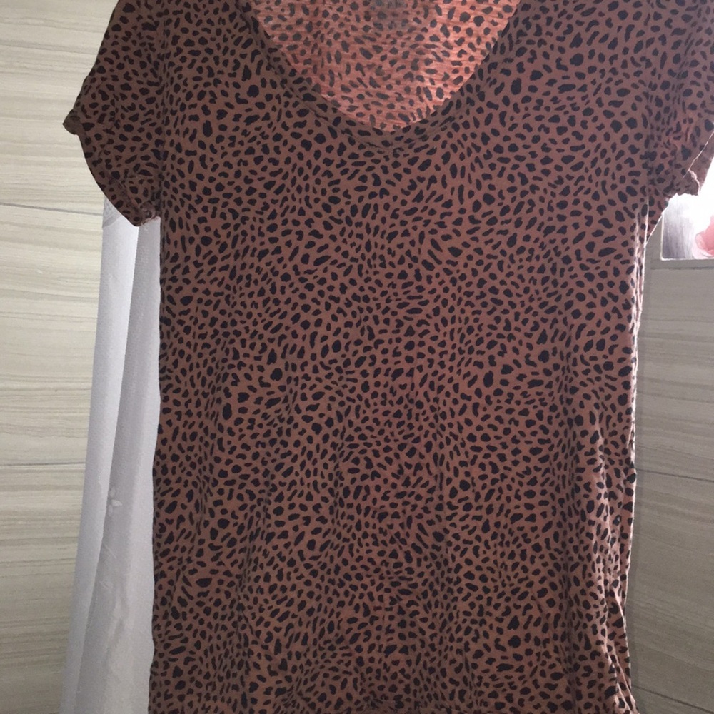 A cheetah print v-necked t shirt